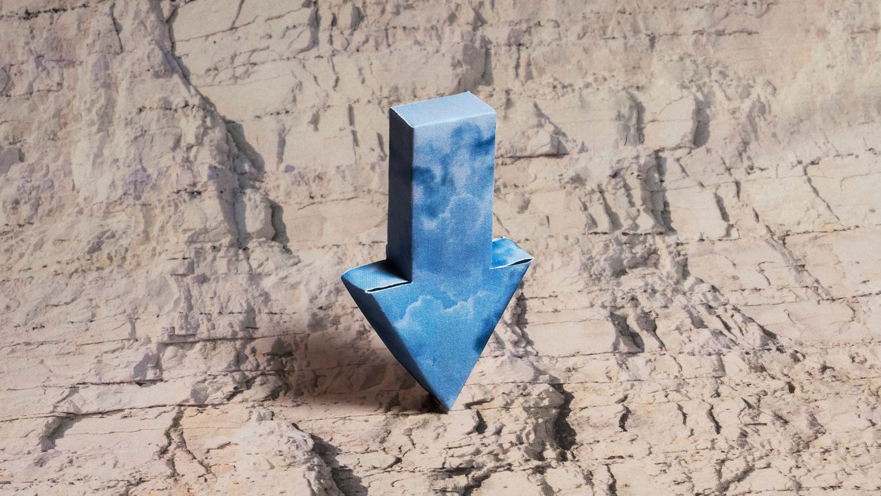 An image showing a three-dimensional arrow with a blue cloudy sky all over it against a limestone background.